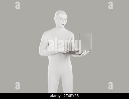 Anonymous man maintains privacy and cyber security while using his laptop computer Stock Photo