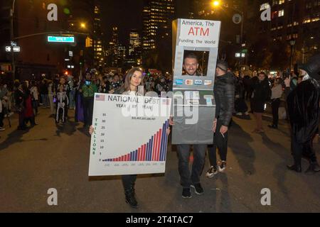 New York, United States. 31st Oct, 2023. Revelers make a political statement with their costumes participate in the New York City's 50th Annual Village Halloween Parade themed 'Upside/Down : Inside/Out!' on October 31, 2023 in New York City. Credit: SOPA Images Limited/Alamy Live News Stock Photo