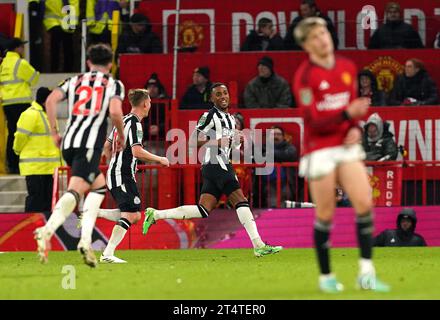 Newcastle United's Joe Willock celebrates scoring their side's third goal of the game during the Carabao Cup fourth round match at Old Trafford, Manchester. Picture date: Wednesday November 1, 2023. Stock Photo