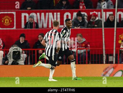 Newcastle United's Joe Willock celebrates scoring their side's third goal of the game during the Carabao Cup fourth round match at Old Trafford, Manchester. Picture date: Wednesday November 1, 2023. Stock Photo