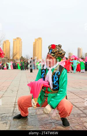 Luannan County- February 21: Chinese traditional style yangko folk dance performance in the street, on February 21, 2016, luannan County, hebei Provin Stock Photo