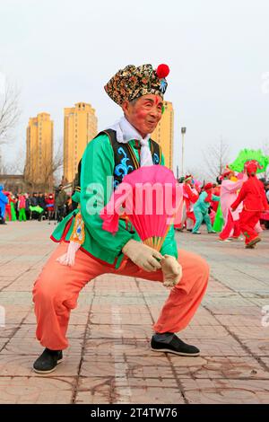 Luannan County- February 21: Chinese traditional style yangko folk dance performance in the street, on February 21, 2016, luannan County, hebei Provin Stock Photo