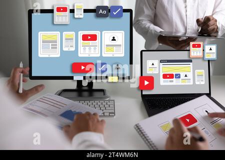 Team designers work on UI and UX designs for mobile app technology, digital interfaces, mobile screens, and mobile phone application design. Stock Photo