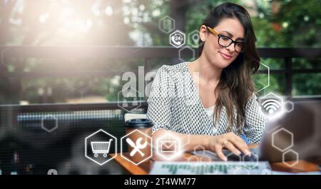 Woman, laptop and digital transformation in analytics, networking or technology software icons outdoors. Female freelancer in futuristic big data Stock Photo