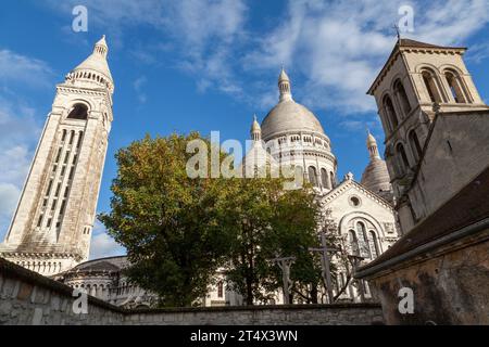 Basilique du Sacré-Cœur de Montmartre and Église Saint-Pierre de Montmartre, Paris, France. Stock Photo