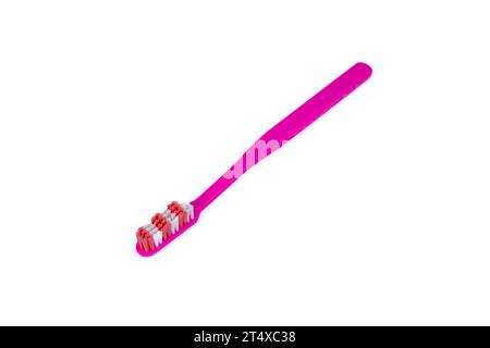 Pink toothbrush on white background Stock Photo