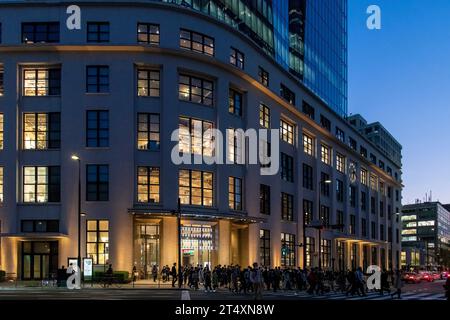 Tokyo, Japan-March 31, 2023; Evening view façade of KITTE retail facility (former Tokyo Central Post Office) in high rise office building JP TOWER in Stock Photo