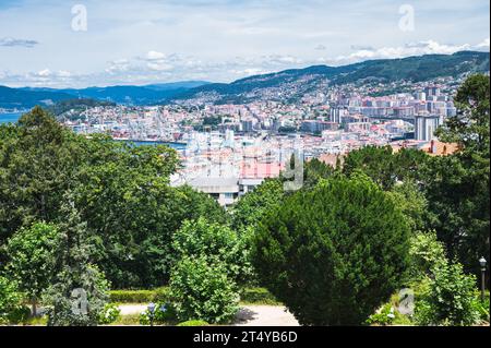 The view from the hill in Parque Monte del Castro, park located on a hill in Vigo, the biggest city in Galicia Region, in the North of Spain. View of the sea, houses and trees, selective focus Stock Photo