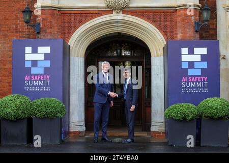 Prime Minister Rishi Sunak (right) welcomes French Minister for Economy, Finance, Industry and Digital Security Bruno Le Maire during the AI safety summit, the first global summit on the safe use of artificial intelligence, at Bletchley Park in Milton Keynes, Buckinghamshire. Picture date: Thursday November 2, 2023. Stock Photo