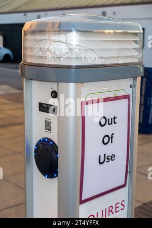 Electric vehicle / ev car charging point described as out of use, so presumably out of order or broken / unavailable due to malfunction. UK (136) Stock Photo