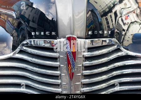 Original radiator Buick auto company grille badge bonnet logo on (looks like) Super 8 American car / vintage old classic 1940's USA vehicle. UK (136) Stock Photo