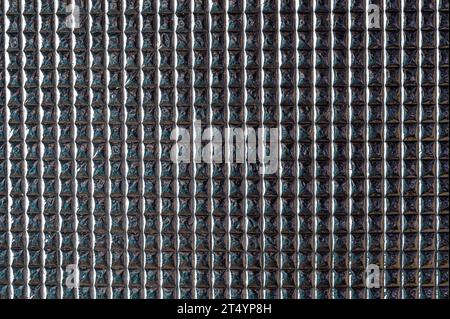 Industrial metal squares pattern background closeup view Stock Photo