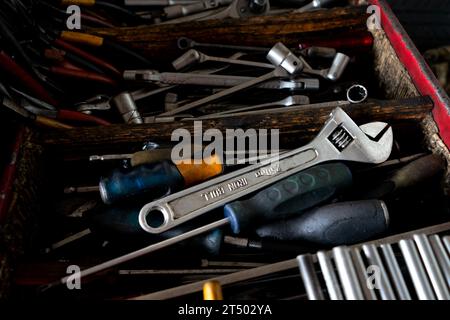 A pile of old spare parts in a garage. Stock Photo