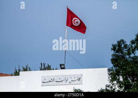 November 2, 2023: Tunis, Tunisia. 02 November 2023. The Tunisia flag on the Tunisian parliament building during an extraordinary parliamentary session in Tunis to discuss a draft law criminalising the normalisation of relations with Israel. If approved, the draft law would criminalise economic, cultural, and military ties with Israel. While the session was taking place, protesters were holding a pro-Palestine and pro-Gaza demonstration outside the Parliament building, to express their support with Palestinians and condemn the ongoing Israeli military offensive in the Gaza Strip (Credit Image: Stock Photo