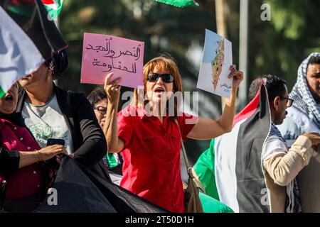 November 2, 2023: Tunis, Tunisia. 02 November 2023. Protesters waive the Palestinian flag and chant slogans in support of Palestinians and against the Israeli military offensive in Gaza outside the Parliament building in Tunis. The demonstration coincided with an extraordinary session by the Tunisian parliament discussing a draft law criminalising the normalisation of relations with Israel. If approved, the draft law would criminalise economic, cultural, and military ties with Israel (Credit Image: © Hasan Mrad/IMAGESLIVE via ZUMA Press Wire) EDITORIAL USAGE ONLY! Not for Commercial USAGE! Stock Photo