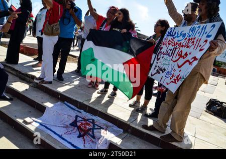 November 2, 2023: Tunis, Tunisia. 02 November 2023. Protesters waive the Palestinian flag and chant slogans in support of Palestinians and against the Israeli military offensive in Gaza outside the Parliament building in Tunis. The demonstration coincided with an extraordinary session by the Tunisian parliament discussing a draft law criminalising the normalisation of relations with Israel. If approved, the draft law would criminalise economic, cultural, and military ties with Israel (Credit Image: © Hasan Mrad/IMAGESLIVE via ZUMA Press Wire) EDITORIAL USAGE ONLY! Not for Commercial USAGE! Stock Photo