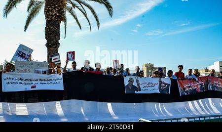 November 2, 2023: Tunis, Tunisia. 02 November 2023. Protesters waive the Palestinian flag and chant slogans in support of Palestinians and against the Israeli military offensive in Gaza outside the Parliament building in Tunis. The demonstration coincided with an extraordinary session by the Tunisian parliament discussing a draft law criminalising the normalisation of relations with Israel. If approved, the draft law would criminalise economic, cultural, and military ties with Israel (Credit Image: © Hasan Mrad/IMAGESLIVE via ZUMA Press Wire) EDITORIAL USAGE ONLY! Not for Commercial USAGE! Stock Photo