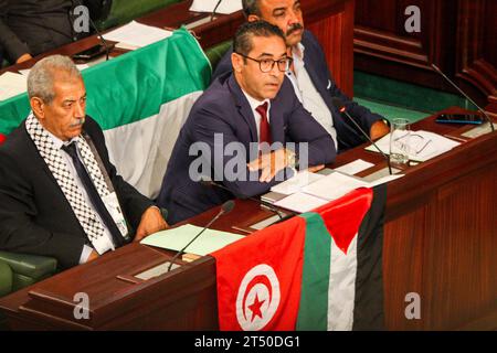 November 2, 2023: Tunis, Tunisia. 02 November 2023. Protesters waive the Palestinian flag and chant slogans in support of Palestinians and against the Israeli military offensive in Gaza outside the Parliament building in Tunis. The demonstration coincided with an extraordinary session by the Tunisian parliament discussing a draft law criminalising the normalisation of relations with Israel. If approved, the draft law would criminalise economic, cultural, and military ties with Israel (Credit Image: © Hasan Mrad/IMAGESLIVE via ZUMA Press Wire) EDITORIAL USAGE ONLY! Not for Commercial USAGE! Stock Photo