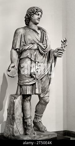 Farnese Lar, colossal Roman statue, 2nd century A.D., from the Terme di Caracalla.                                  National Archaeological Museum of Naples Italy. Stock Photo
