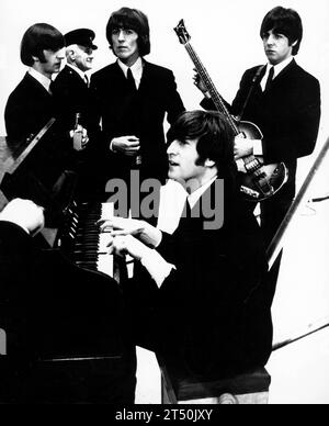 November 1, 1965, Manchester, England, United Kingdom: From L-R. are RINGO STARR, GEORGE HARRISON, PAUL MCCARTNEY and JOHN LENNON (piano) during filming of 'The Music of Lennon and McCartney' TV Special. Due to be screened on December 16th is entirely based on music and lyrics by PAUL MACCARTNEY and JOHN LENNON who also introduce each artist. The show has been recorded at Granada's Manchester TV studios and the pictures where taken during the recording. (Credit Image: © Keystone Press Agency/ZUMA Press Wire) EDITORIAL USAGE ONLY! Not for Commercial USAGE! Stock Photo