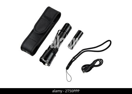 Modern metal LED flashlight in black color. Portable flashlight isolate on a white background. Stock Photo