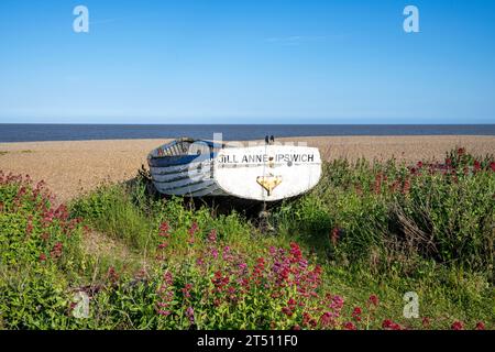 Fishing boat on the shingle beach at Aldeburgh, Suffolk, UK Stock Photo