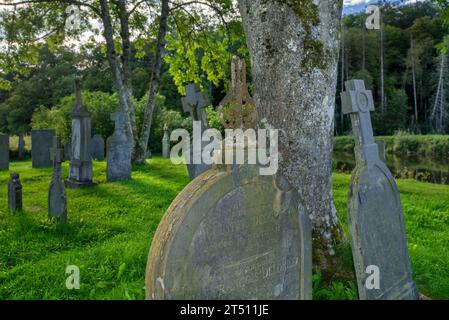 Le Vieux Cimetière, old cemetery along the Semois river with 16th and 17th century tombstones in the village Mortehan, Bertrix, Luxembourg, Belgium Stock Photo