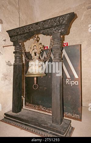 Tibetan bell at the entrance of the Brunico Castle, home of the Messner Mountain Museum Ripa, Brunico (Bruneck), Trentino-Alto Adige, Italy Stock Photo