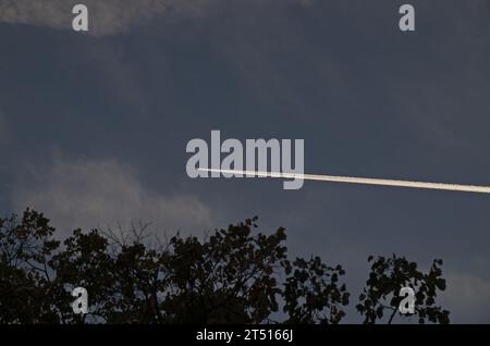 A white track, in the sky from a plane en route over the city of Sofia, Bulgaria Stock Photo