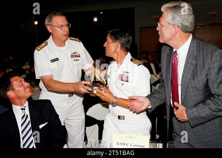 110804-N-HW977-794 LOS ANGELES, Calif. (Aug. 4, 2011) Vice Adm. Kevin McCoy, second from left, commander of Naval Sea Systems Command, shares the 2011 Engineer of the Year Title Sponsor Award with Capt. Jay Kadowaki, commanding officer of Naval Surface Warfare Center, Corona Division, and technical director Dr. William Luebke, right, as public affairs officer Troy Clarke looks on during the annual Greater Los Angeles Engineer of the Year Awards Gala at California State University-Los Angeles. McCoy was recognized for the on-going partnership of his command with the university that encourages s Stock Photo