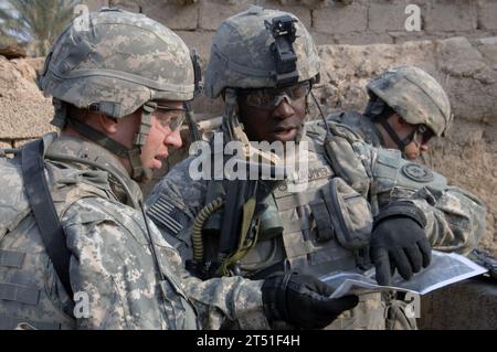 0801021132M-025 SHEIK SA'ID, Iraq (Jan. 2, 2008) U.S. Army Soldiers attached to 3rd Squadron, 2nd Cavalry Regiment patrol and search for weapons or Improvised Explosive Devices (IED) during a clearing mission. U.S. Navy Stock Photo