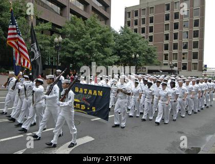 0807041512O-088 BOSTON (July 4, 2008) Sailors assigned to the multi-purpose amphibious assault ship USS Bataan (LHD 5) participate in the Fourth of July parade through Boston beginning at City Hall for a flag raising ceremony and ending at the State Building for a reading of the Declaration of Independence. Bataan is in Boston participating in the 27th annual Boston Harborfest, a six-day long Fourth of July festival showcasing the colonial and maritime heritage of the cradle of the American Revolution. U.S. Navy Stock Photo