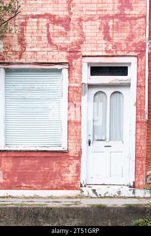 Old vintage downtown brick building front door Stock Photo