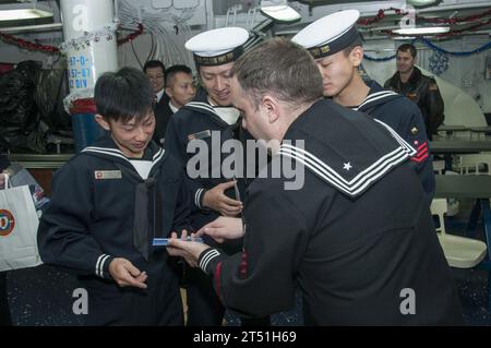 7th Fleet, bilateral, Bonhomme Richard Amphibious Ready Group, Christmas, gift exchange, japan maritime self defense force, JS Kuruma, PACOM, Sasebo, sister ship, tour, U.S. Navy, USS Bonhomme Richard (LHD 6) Stock Photo