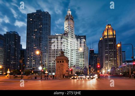 Michigan Avenue with ornate skyscrapers in downtown Chicago, USA at night Stock Photo