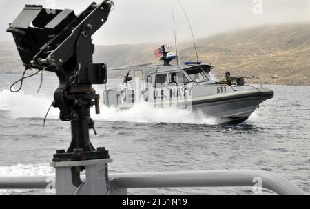 110719NX238-014 SAN CLEMENTE ISLAND, Calif. (July 19, 2011) Sailors assigned to Maritime Expeditionary Security Squadron (MSRON) 11 conduct patrol boat maneuvers on a 34-foot Sea Ark Dauntless tactical craft off San Clemente Island during ULTRA 2011.  ULTRA is a two-week exercise focusing on expeditionary warfare skill qualifications and battle readiness to prepare for deployments. Navy Stock Photo