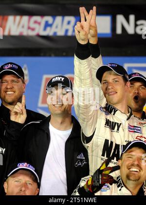 0808225345W-259 BRISTOL, Tenn. (Aug. 22, 2008) JR Motorsports co-owner Dale Earnhardt, Jr., center, celebrates with driver Brad Keselowski, right, and the rest of the No. 88 U.S. Navy Chevrolet Monte Carlo team in victory lane after winning the NASCAR Nationwide Series Food City 250 at Bristol Motor Speedway in Bristol. Keselowski overcame a 37th place starting position to claim his second career victory and won second place overall in the nationwide championship standings. Navy Stock Photo