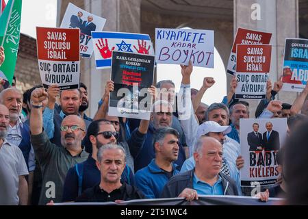 Istanbul, Turkey. 27th Oct, 2023. Protesters hold placards expressing their opinion during the demonstration. Turkish individuals congregated outside Taksim Mosque in Istanbul after Friday prayers, demonstrating their solidarity with the people of Gaza in Palestine. They offered prayers and voiced their unwavering support for the Palestinian community in the face of ongoing events. (Photo by Shady Alassar/SOPA Images/Sipa USA) Credit: Sipa USA/Alamy Live News Stock Photo