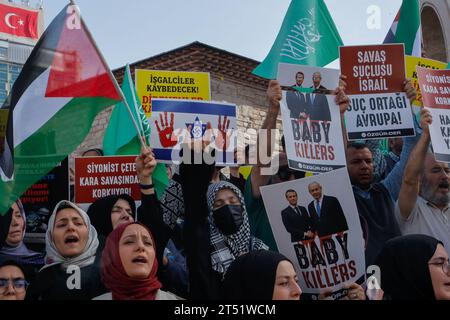 Istanbul, Turkey. 27th Oct, 2023. Protesters hold placards expressing their opinion during the demonstration. Turkish individuals congregated outside Taksim Mosque in Istanbul after Friday prayers, demonstrating their solidarity with the people of Gaza in Palestine. They offered prayers and voiced their unwavering support for the Palestinian community in the face of ongoing events. (Photo by Shady Alassar/SOPA Images/Sipa USA) Credit: Sipa USA/Alamy Live News Stock Photo