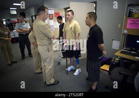 0707180696M-260 SAN DIEGO (July 18, 2007) - Chief of Naval Operations (CNO) Adm. Mike Mullen speaks with amputee service members undergoing therapy at Naval Medical Hospital Balboa. U.S. Navy Stock Photo