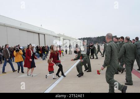 1012191079B-655 VIRGINIA BEACH (Dec. 18, 2010) Pilots from Strike Fighter Squadron (VFA) 32 are greeted by friends and family members during a homecoming ceremony at Naval Air Station Oceana. VFA-32, part of Carrier Air Wing (CVW) 3, completed a seven-month deployment aboard the aircraft carrier USS Harry S. Truman (CVN 75). During their deployment, CVW-3 provided close air support, armed overwatch, electronic warfare, and intelligence, surveillance, and reconnaissance over Afghanistan in support of operations Enduring Freedom and New Dawn. Navy Stock Photo