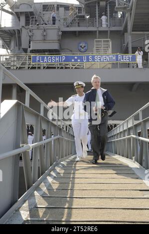 0908290021M-038 BUSAN, Republic of Korea (Aug. 29, 2009) Secretary of the Navy (SECNAV) the Honorable Ray Mabus and Vice Adm. John M. Bird, commander, 7th Fleet, descend the brow for an all-hands call during MabusХ tour of the amphibious command ship USS Blue Ridge (LCC 19). Blue Ridge, embarked 7th Fleet staff and FASTPAC hosted Mabus' first official visit to the Republic of Korea since being appointed Secretary of the Navy in May. Navy Stock Photo