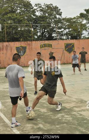 111127ZR315-440 PUETRO BARRIOS, Guatemala (Nov. 27, 2011) U.S. Marines assigned to Special Purpose Marine Air Ground Task Force play soccer with members of the Guatemalan special forces. The Marines are supporting Amphibious-Southern Partnership Station 2012, an annual deployment of U.S naval assets in the U.S. Southern Command area of responsibility. Stock Photo