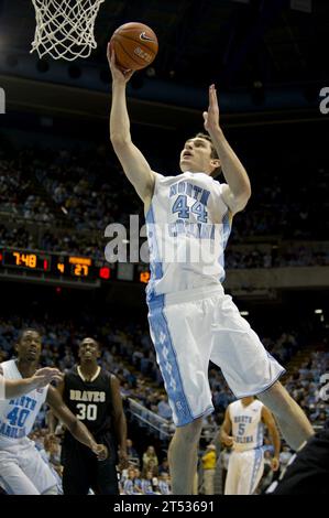 111027QF368-685 CHAPEL HILL, N.C. (Oct. 27, 2011) Tyler Zeller, forward for University of North Carolina Tar Heels, competes in a exhibition game to prepare for the inaugural Quicken Loans Carrier Classic basketball game against Michigan State University aboard USS Carl Vinson (CVN 70) on Veteran's Day Nov. 11. Stock Photo