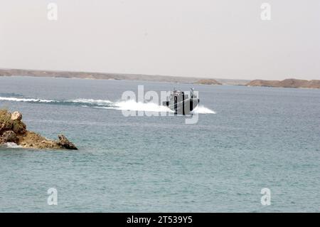 0704274928M-030 HADITHA DAM, Iraq (April 27, 2007) - A Small Unit Riverine Craft (SURC), from the NavyХs Riverine Squadron (RIVRON) 1, conducts an orientation ride in Lake Qadisiya, the man-made reservoir on the North side of Haditha Dam. RIVRON 1, based out of Naval Amphibious Base (NAB) Little Creek, is currently supporting the 2nd Marine Expeditionary Force (II MEF) in the Al Anbar province of Iraq. The deployment marks the first for a Navy riverine squadron since the Vietnam War. U.S. Navy Stock Photo