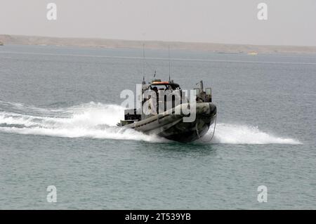 0704274928M-032 HADITHA DAM, Iraq (April 27, 2007) - A Small Unit Riverine Craft (SURC), from the NavyХs Riverine Squadron (RIVRON) 1, conducts an orientation ride in Lake Qadisiya, the man-made reservoir on the North side of Haditha Dam. RIVRON 1, based out of Naval Amphibious Base (NAB) Little Creek, is currently supporting the 2nd Marine Expeditionary Force (II MEF) in the Al Anbar province of Iraq. The deployment marks the first for a Navy riverine squadron since the Vietnam War. U.S. Navy Stock Photo