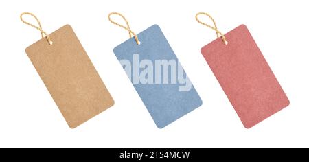 A blank tag tied to hang on a product to display a price or discount. Paper tags on white background. Stock Photo