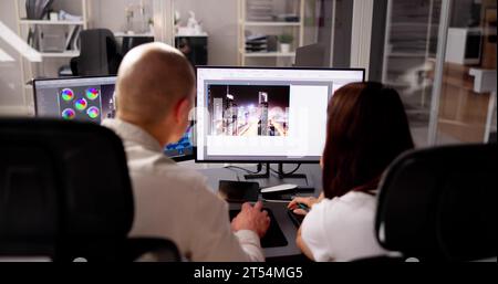 Graphic Web Designer Artist Using Computer To Design Stock Photo