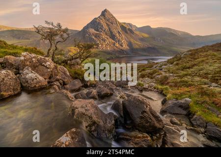 The Afon Lloer is a river in Snowdonia, North Wales, that flows towards the mountain Tryfan. Stock Photo