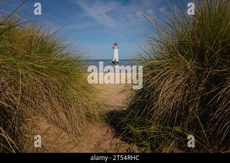 Point of Ayr Lighthouse is a 19th-century lighthouse located on the east side of the Dee Estuary, next to Talacre Beach. Stock Photo